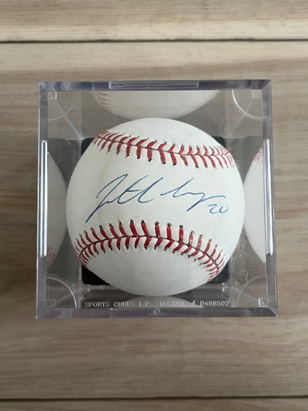 Jonathan Lucroy Rawlings White Baseball with Red Stitching in Display Stand